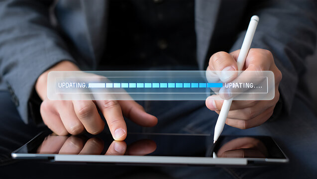 Person using tablet with progress bar stylus updating