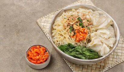 Mie Ayam Pangsit. Wonton Chicken Noodles are a type of wet noodle also known as 