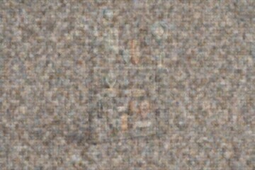 Fototapeta premium Colorful artwork composed of pebbles arranged on a sandy beach during the afternoon sunlight, showcasing natural colors and textures Generative AI