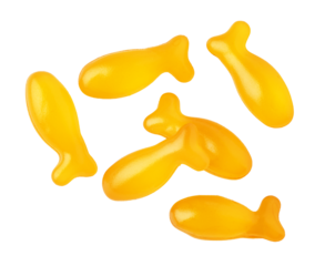 Five gummy fish candies falling on transparent background
