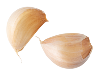 Two garlic cloves falling on transparent background