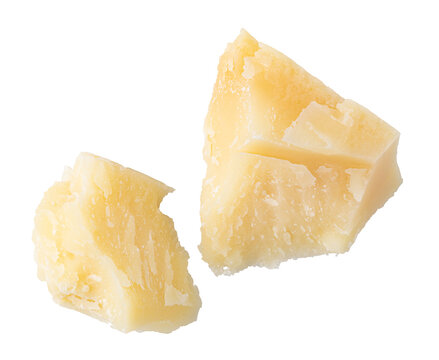 Pieces of parmesan cheese falling on transparent background