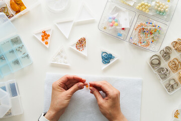 Crocheting and jewelry making from a top view