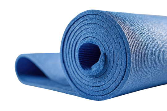 Rolled-up blue exercise mat.  Close-up of a coiled blue yoga mat, lying on its side, showing textured surface
