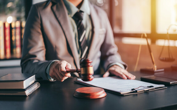 Adult Asian Man with Gavel in Law Office for Legal Consultation Courtroom Justice Judgement Courthouse Lawyer Attorney Advise Agreement