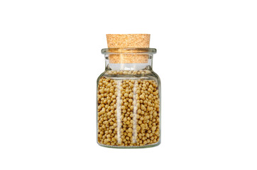 mustard in glass container isolated on white background