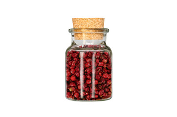 pink peppercorn in glass container isolated on white background