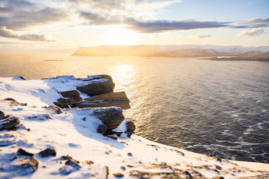 rocks in front of ocean morning light