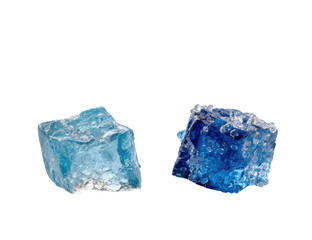 Obraz premium Two faceted, light-blue and deep-blue crystals, close-up