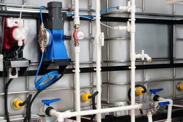 Industrial  concept. equipment of boiler house valves tubes  pressure gauges, thermometer. manometer, pipe, flow meter, water pumps and valves of heating system in boiler room.