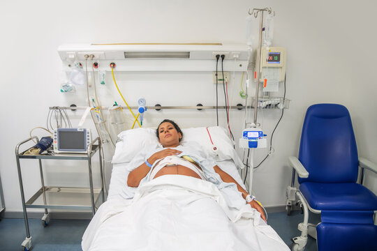 Expectant mother in hospital preparing for childbirth