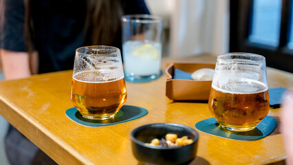 Relaxed restaurant setting with drinks and snacks