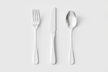 Silverware Set: Fork, Knife, and Spoon arranged side-by-side on white