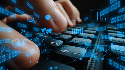A close-up view of hands actively typing on a keyboard with an overlay of digital data visualizations, including charts and graphs, conveying a sense of modern technology and data analysis. Xenic