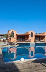 Luxury colonial hotel with swimming pool.