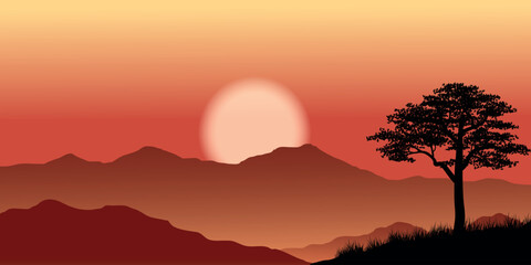 sunset over a mountainous landscape. The silhouette of a lone tree can be seen in the foreground, and the mountains have several layers in shades of brown and red.