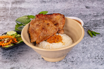 Roasted pork steak with rice
