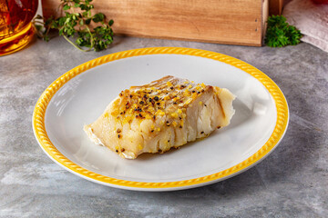 Steamed cod fish fillet with spices