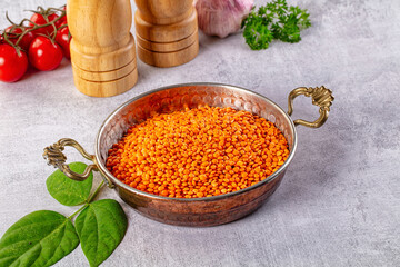 Raw dry red lentil in the bowl