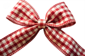 Checkered red and white gingham bow isolated on transparent background is perfect for adding a touch of rustic charm to any craft or holiday project