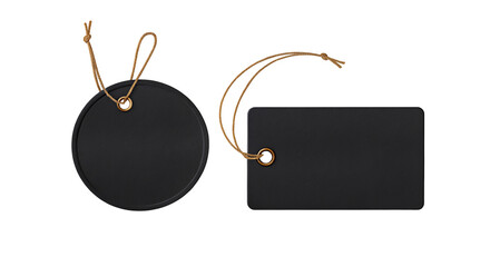 Elegant black blank tags with strings for branding and gift packaging on dark background