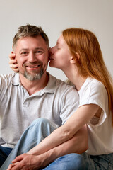 Happy couple sharing a joyful moment together at home