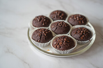 Fresh Homemade Chocolate Muffins close up product shot