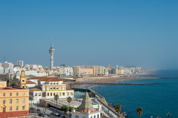 Panoramic coastal view of Cadiz skyline with communications tower and Atlantic beach Spain © Sara