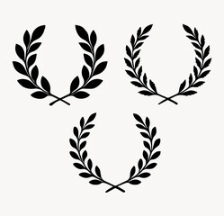 Set of black laurel wreath silhouettes isolated on white background © Serhii Bielik