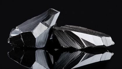 Fototapeta premium shiny obsidian shards on black background