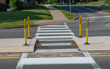 Crosswalk with Yellow Safety Bollards