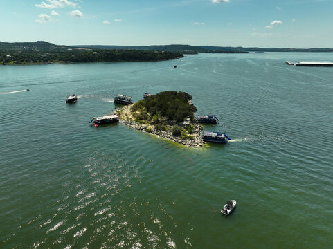 Aerial view of boats docked on a small island on Lake Travis in Austin, TX USA