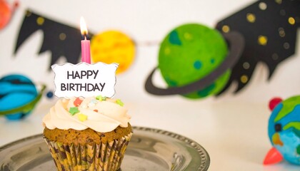 Birthday cupcake with space-themed decorations