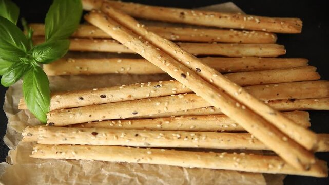 Grissini breadsticks whole grain cereal fresh delicious gourmet food background on the table rustic food top view copy space