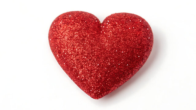 A single vibrant red glitter heart shape isolated on a clean white background symbolizing love and romance