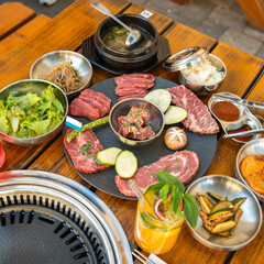 Traditional Korean BBQ Platter with Side Dishes