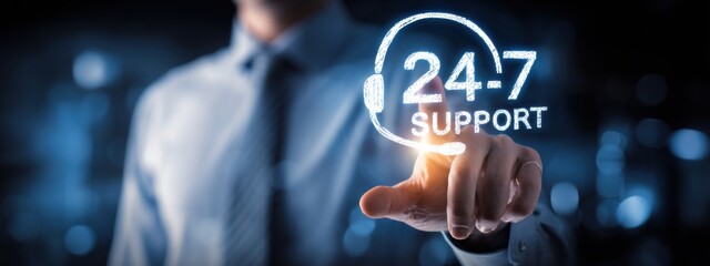 Professional man offering 24-7 support services in a modern office environment with digital interface