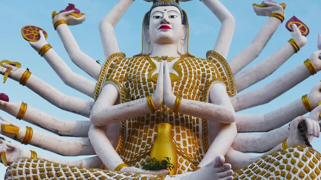 Wat Plai Laem. The temple of the many-armed Buddha and the temple of the three religions