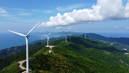 Wind turbines on a mountain range overlooking the ocean