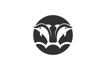 Two dolphins face each other within a circular black shape