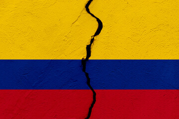 The flag of the Republic of Colombia into a grunge cracked wall