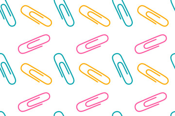 Seamless vector pattern with colorful paperclips. Perfect for backgrounds and creative projects.