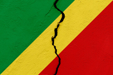 The flag of the Republic of the Congo into a grunge cracked wall