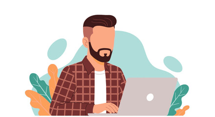 A stylish bearded man in a plaid shirt focuses on his laptop, illustrating modern remote work, digital creativity, and a contemporary lifestyle.