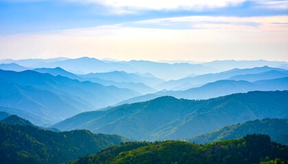 Obraz premium Misty mountain ranges stretch into the horizon