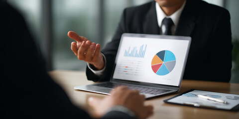 businessman showing pie chart laptop online meeting