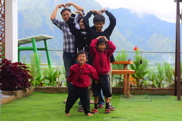 mother and daughter playing in the park