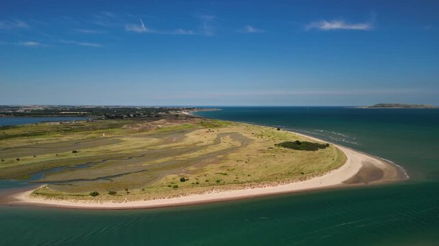 Slow fly right with views of Lambay Island, ships entering the Irish Sea and Malahide Beach.