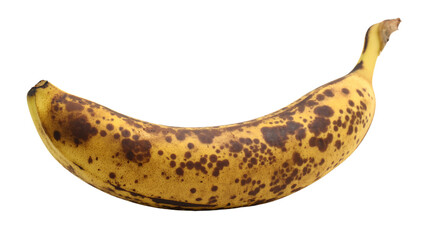 a banana with spots on it sitting on a table