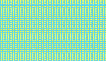 A vibrant yellow dotted pattern on a light teal background